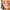 Does Getting A Crown Hurt woman smiling with beautiful teeth for does getting a crown hurt blog post